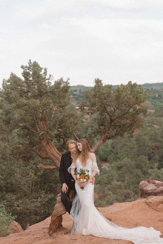 Bride and groom celebrating their Garden of the Gods elopement