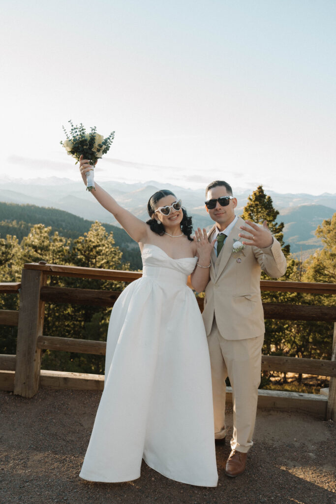 Bride and groom celebrating their sunset elopement at Lost Gulch Overlook