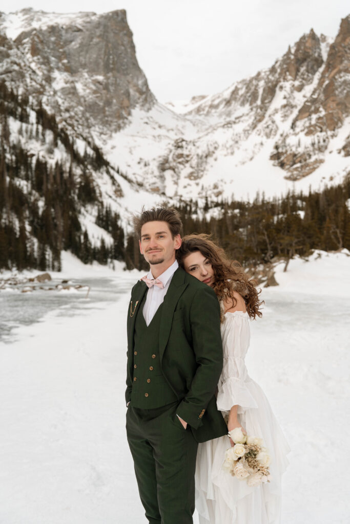 couple hiking to Dream Lake for their Colorado elopement